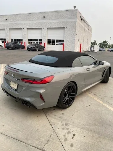 Gray BMW M8 convertible after a full exterior detail and paint decontamination